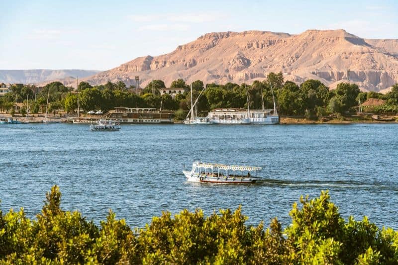 The Nile at Luxor, with the Theban hills behind the West Bank
